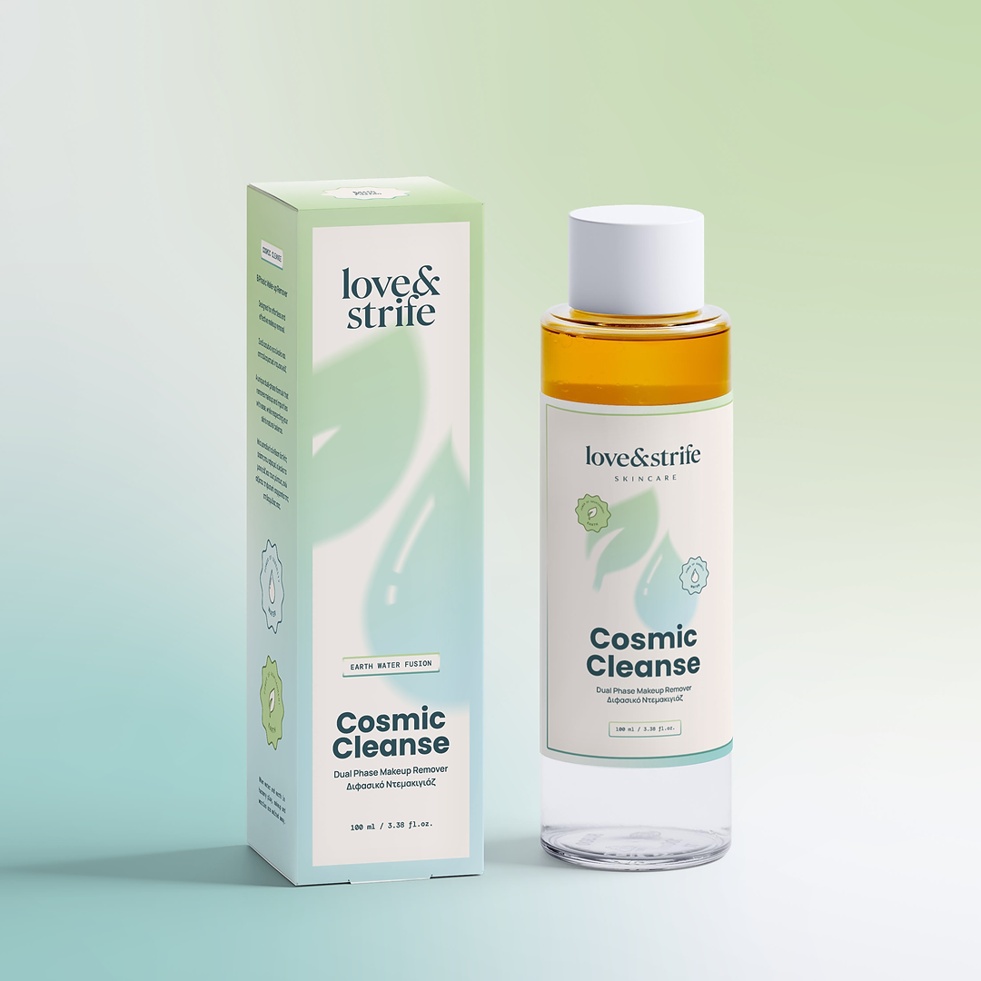 Love & Strife Cosmic Cleanse dual phase makeup remover in clear bottle with visible oil and water layers, shown next to its green box on a soft green background.