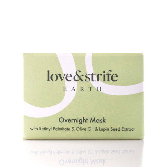 Green box of "love&strife Earth Overnight Mask" with Retinyl Palmitate, Olive Oil, and Lupin Seed Extract. The packaging features the product name and key ingredients in dark green text on a light green background with white curved lines, emphasizing natural and earthy themes.